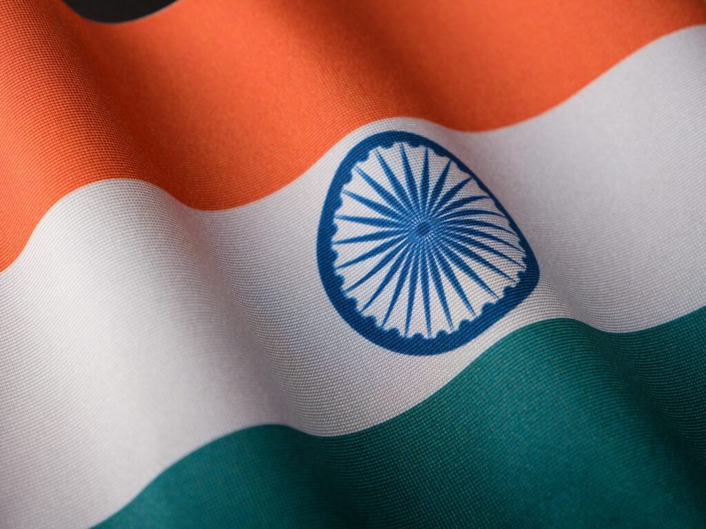 pexels-photo-15483615-15483615 Detailed view of the Indian flag with vibrant colors and texture.