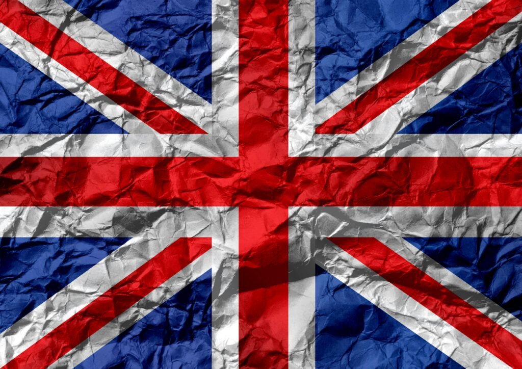 pexels-photo-968299-968299 Crumpled texture of the Union Jack flag, symbolizing UK unity and heritage.